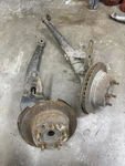 Porsche 911 Oem Rear Trailing Arm Pair Left And Right With Hub & Rotors 69-73. Fixed Price $800.00.
